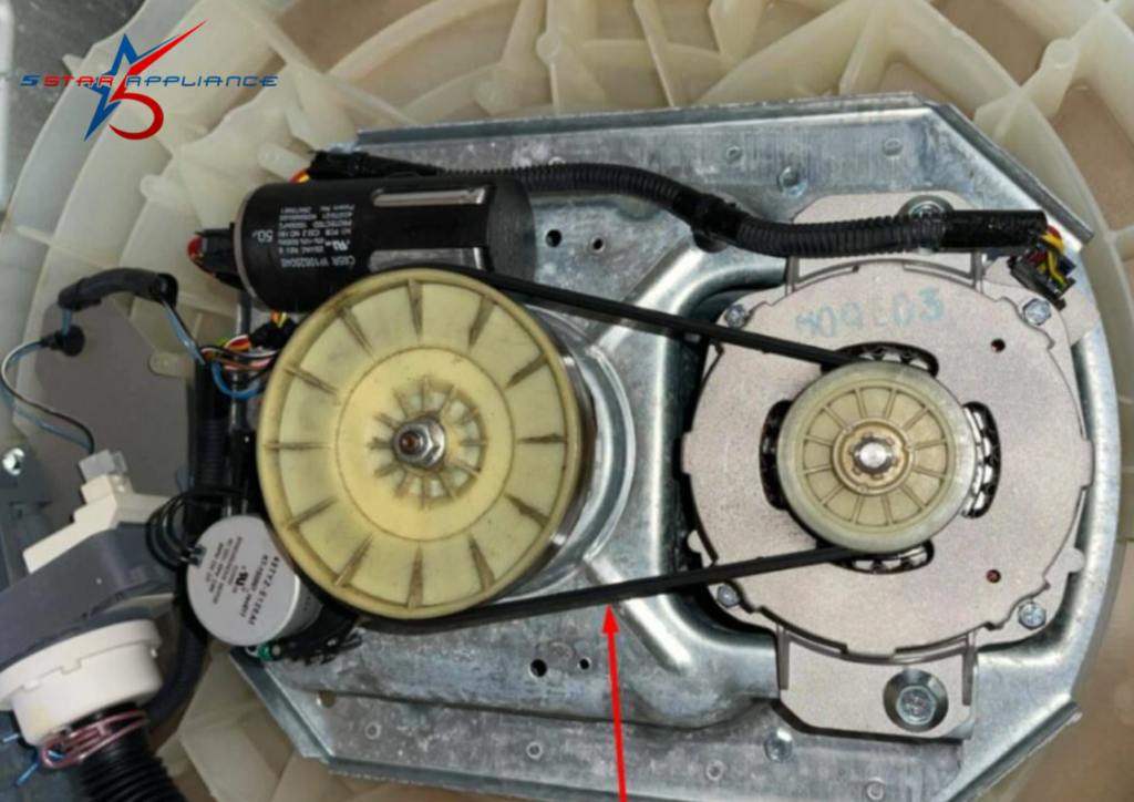 washing machine damaged drive belt close-up showing worn belt on motor pulley